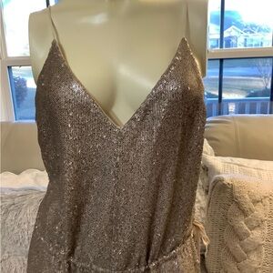 Anthropology
Champagne Sequin Jumpsuit
Size N/A This Jumpsuit was a Sample